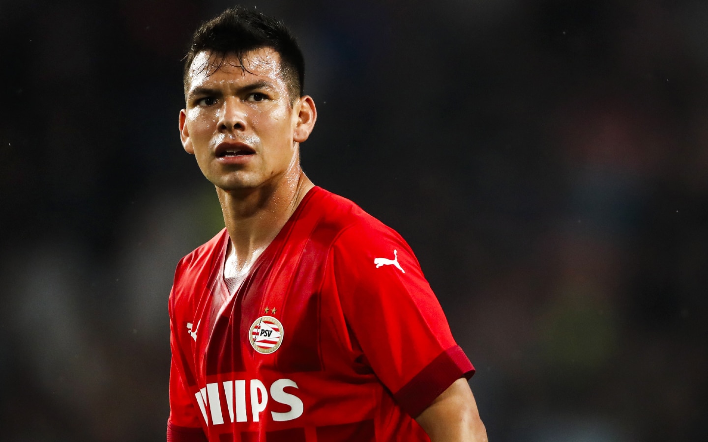 Hirving Lozano en partido con la playera del PSV.