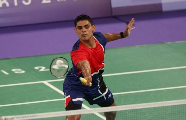 Luis Garrido en su partido de badminton ante China.