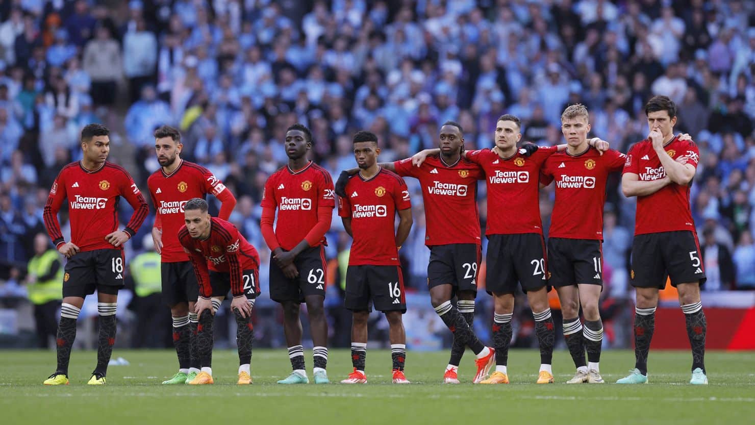 Jugadores de Manchester United en partido de la jornada pasada.